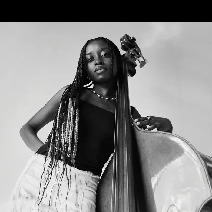 # Amy Gadiaga Is Bringing Jazz, Soul, and Bold Woman Energy Into One Fresh Sound BTS Music Group’s jazz spotlight turns to **Amy Gadiaga**, a London-based bassist, vocalist, and composer whose sound lives where jazz tradition, soul, R&B, African influence, and bold self-expression meet. Amy Gadiaga is not the type of artist who fits neatly into one box. Her music carries the discipline of a trained jazz musician, the emotion of a soul singer, and the confidence of a new-generation creative who understands that jazz can still be fresh, colorful, stylish, and deeply personal. Born in the Paris suburbs and now based in London, Gadiaga has been building her name inside the modern UK jazz movement. Her background gives her music a wide cultural reach, pulling from French, African, jazz, R&B, and soul influences. That mix is part of what makes her stand out. She is not simply performing jazz standards or chasing a retro sound. She is using jazz as a foundation to tell her own story. Her current project, ***BabyGoated***, shows an artist stepping fully into her voice. The EP is confident, emotional, and genre-fluid, moving through upright bass, warm piano, trumpet, soulful vocals, and modern rhythmic energy. The title itself reflects Amy’s creative balance: soft but strong, vulnerable but confident, youthful but serious about the craft. Before *BabyGoated*, Amy introduced many listeners to her world through ***All Black Everything***, a project that helped establish her as a fresh voice in the London jazz scene. That release carried themes of identity, empowerment, pride, and freedom, setting the tone for an artist who uses music as both expression and statement. What makes Amy Gadiaga special is her dual role as both vocalist and bassist. That gives her music a different kind of authority. She is not just singing over the band — she is part of the engine driving the sound. Her bass work grounds the music, while her voice brings emotion, personality, and storytelling to the front. Her style has been described as sitting between jazz and R&B, but there is more happening than that. Amy’s music has the spirit of classic jazz, the warmth of neo-soul, the color of African-rooted creativity, and the confidence of an artist who knows exactly how she wants to be seen and heard. The community side of her story is also important. Amy Gadiaga has been connected to platforms and spaces that support young, forward-thinking jazz talent, including Jazz re:freshed, Tomorrow’s Warriors-related programming, and women-centered jazz media spaces. These communities matter because they help bring new jazz voices to audiences that may not always find them through mainstream channels. Amy’s presence in the UK jazz scene also helps push representation forward. As a Black female instrumentalist, vocalist, composer, and bandleader, she brings visibility to a lane where women are still too often underrepresented, especially on instruments like bass. Her work carries confidence, pride, and creative freedom without losing musicianship. For new listeners, **“BabyGoated”** is the best place to start. From there, **“who knows,” “All Black Everything,” “Paloma Negra,” “Full Sun,”** and **“Soar When I’m Alone”** give a wider picture of her range. These songs show her ability to move between bold energy, soft emotion, jazz structure, and soul feeling. Amy Gadiaga is the kind of artist BTS Music Group looks for: original, talented, intentional, and still rising. She has the sound, image, musicianship, and story to connect with listeners who want jazz that feels alive today. She is not just preserving jazz. She is reshaping it in her own image. ## Quick Facts **Artist Name:** Amy Gadiaga **Location:** London, UK **Origin:** Paris suburbs **Genre:** Jazz / Vocal Jazz / Jazz-R&B / Neo-Soul / Alternative R&B **Primary Roles:** Bassist, vocalist, composer, bandleader **Current Project:** *BabyGoated* **Release Year:** 2026 **Previous Project:** *All Black Everything* **Recommended Tracks:** “BabyGoated,” “who knows,” “All Black Everything,” “Paloma Negra,” “Full Sun,” “Soar When I’m Alone” **Artist Angle:** A rising female jazz artist blending upright bass, soulful vocals, African-rooted identity, and modern London jazz energy ## Why BTS Music Group Selected Her Amy Gadiaga was selected because she represents the new face of jazz: skilled, expressive, culturally rooted, and unafraid to blend sounds. She brings real musicianship, a strong visual identity, and a sound that can reach jazz listeners, neo-soul fans, R&B audiences, and independent music supporters. Her music feels fresh without disrespecting the foundation. That balance makes her a strong BTS Music Group jazz feature. ## Links **Official Linktree:** https://linktr.ee/amygadiaga **Instagram:** https://www.instagram.com/amy.g.adiaga/ **Bandcamp:** https://amygadiaga.bandcamp.com/ **Spotify Artist Page:** https://open.spotify.com/artist/0dxlAHVTQOgD6ZRwSeit7x **Apple Music / iTunes Artist Page:** https://music.apple.com/us/artist/amy-gadiaga/1585192551 **Apple Music / iTunes — BabyGoated EP:** https://music.apple.com/us/album/babygoated-ep/1851294023 **Bandcamp — BabyGoated:** https://amygadiaga.bandcamp.com/album/babygoated **Bandcamp — All Black Everything:** https://amygadiaga.bandcamp.com/album/all-black-everything **Pitchfork Review — BabyGoated:** https://pitchfork.com/reviews/albums/amy-gadiaga-babygoated-ep/ **Jazz re:freshed SXSW 2026 Feature:** https://www.jazzrefreshed.com/sxsw2026
